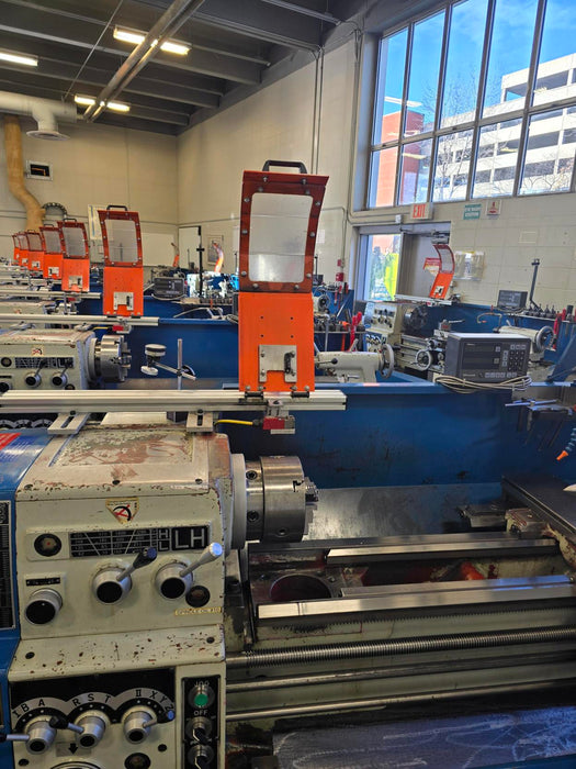 interlocked lathe chuck guarding in a machine shop